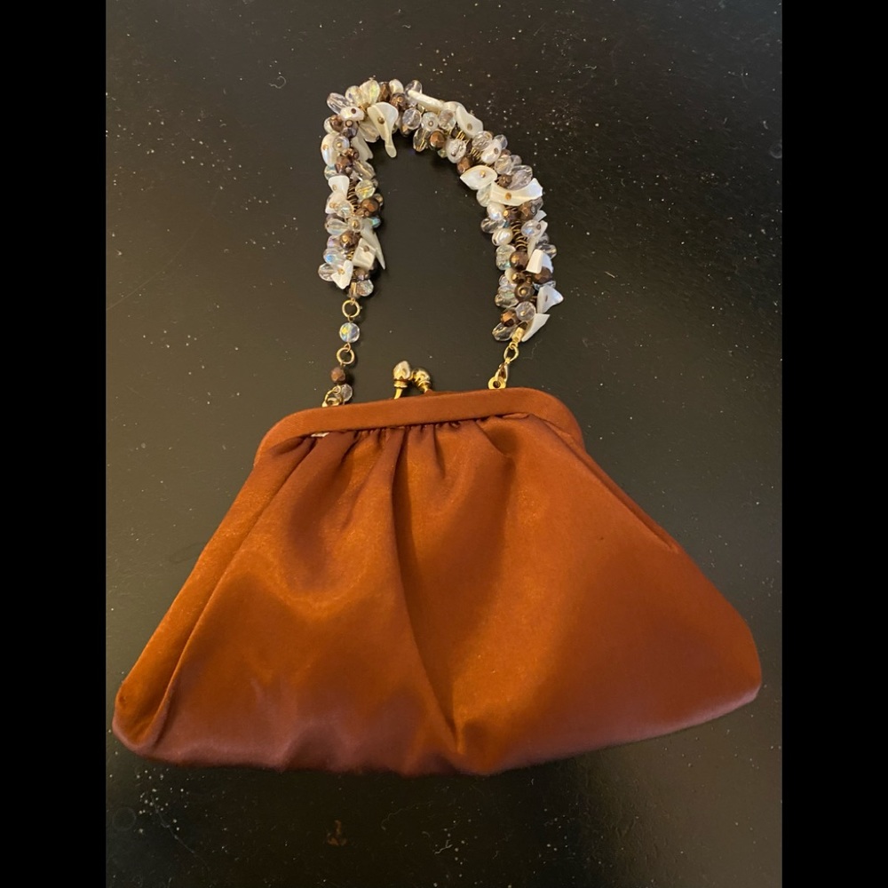 Sweet rust color satin bag with stone /bead handle used once